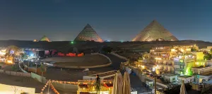 Show Prints: View of Giza Pyramids from rooftop terrace during light show, Cairo, Egypt, Africa