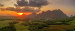 Mountain Ranges Prints: View of golden sunset behind Long Mountain and patchwork of green fields