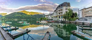 Docked Prints: View of The Grand Hotel, mountains and Lake Zell during golden hour
