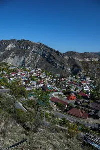 Settlement Prints: View of Gunib village in Dagestan with mountains in the background showcasing residential homes
