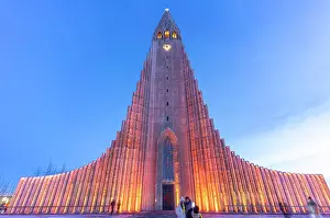 Michael Prints: View of Hallgrimskirkja church illuminated at dusk in winter, Reykjavik, Iceland