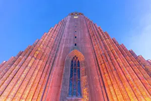 Aesthetic Prints: View of Hallgrimskirkja church illuminated at dusk in winter, Reykjavik, Iceland