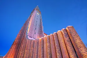 Wonderland Prints: View of Hallgrimskirkja church illuminated at dusk in winter, Reykjavik, Iceland