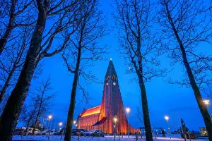 Striking Prints: View of Hallgrimskirkja church illuminated at dusk in winter, Reykjavik, Iceland