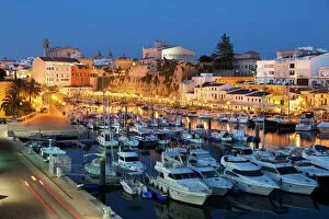 Spanish Culture Gallery: View over harbour and Ayuntamiento de Ciutadella at night, Ciutadella, Menorca, Balearic Islands