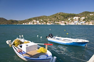 Ionian Prints: View across the harbour, colourful fishing boat in foreground