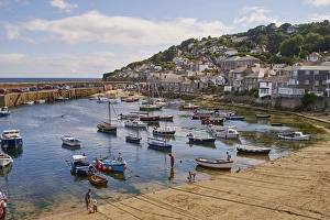 View of the harbour at mid-tide, Mousehole, Penwith, Cornwall, England, United Kingdom