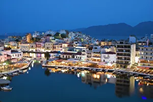 Images Dated 17th April 2008: View over harbour and restaurants at dusk, Ayios Nikolaos, Lasithi region, Crete, Greek Islands