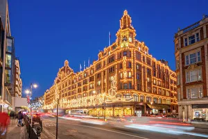 Light Trail Prints: View of Harrods department store illuminated at dusk