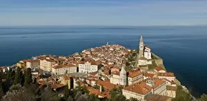 View from a hill overlooking the old town of Piran and St. George Church