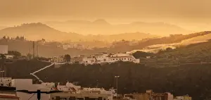 Gran Canaria Prints: View of hillside houses and mountains at sunset near El Pagador