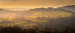 Matlock Prints: View of hilltop Riber Castle during winter at sunset