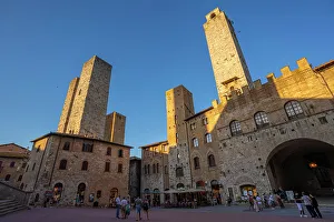 Pedestrians Prints: View of historic centre and towers in Piazza del Duomo