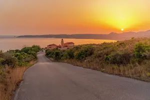 View of Holy Monastery of the Most Holy Theotokos of Sissia near Lourdata at sunset, Kefalonia, Ionian Islands, Greek Islands, Greece, Europe