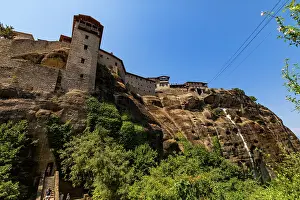 Thessaly Prints: View of Holy Monastery of Varlaam with tower and waterfall in Meteora Greece