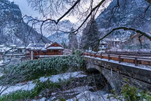 Chalet Prints: View of hotels and lodges with mountains in background during winter
