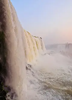 Foaming Prints: View of the Iguazu Falls at sunset