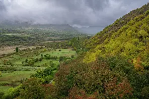 Mountainous Prints: View from Ikoti Monastery overlooking hills and valleys with dense vegetation in Leningor Republic of South Ossetia