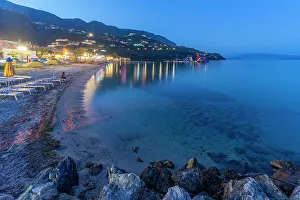 Vacation Spot Prints: View of Ionian Sea and Ipsos Beach in Ipsos at dusk