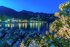 Corfu Prints: View of Ionian Sea and Ipsos Beach in Ipsos at dusk