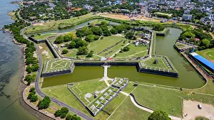 Dutch Prints: View of Jaffna Dutch Fort showing its large walls and green space in Jaffna