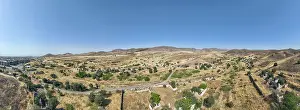 Settlement Prints: View of Jayabril with open fields and distant mountains in Qarabaqh during daytime in Azerbaijan