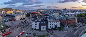 Public Space Prints: View of Jernbanetorget and city skyline from elevated position at sunset
