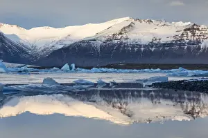 South Iceland Prints: View over Jokulsarlon glacial lagoon towards snow-capped mountains and icebergs