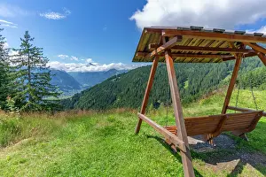 Bench Prints: View of Kaprun and mountains toward Grossglockner from Plettsaukopf Reservoir on a sunny day