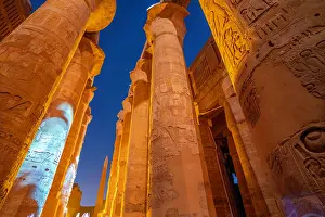 Pillars Prints: View of Karnak Temple sound and light show at dusk, Luxor, Egypt, Africa