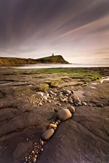 Images Dated 26th February 2009: View across Kimmeridge Bay at dusk towards Hen Cliff and Clavell Tower