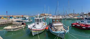 Recreational Prints: View of Koules Venetian Fortress and boats in Heraklion Venetian Port during sunny weather in Crete