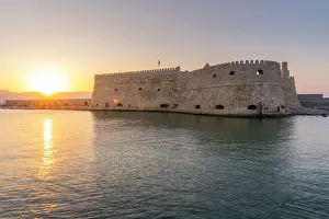 Cruise Prints: View of Koules Venetian Fortress with sunset over the water in Heraklion Crete Greece