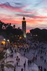 Typically Moroccan Prints: View towards Koutoubia Minaret at sunset from Djemaa el Fna