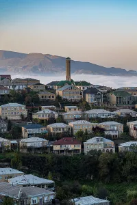 Neighborhood Prints: View of Kubachi town with houses and a tower in Dagestan, Russia during the day