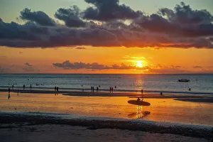 Carrying Prints: View of Kuta Beach at sunset, Kuta, Bali, Indonesia, South East Asia, Asia