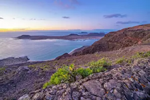 Las Palmas Prints: View of La Graciosa Island and Caleta del Sebo town from Mirador del Rio at sunset