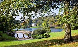 Autumn Gallery: View across lake to the distant Pantheon in autumn, with Palladian bridge