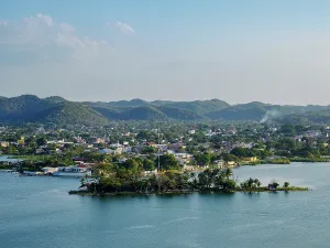 Regional Prints: View of lake peten itza and san benito from mirador rey canek in guatemala