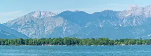 Streams Prints: View of Lake Zell from Zell am See and mountainous backdrop on a sunny day