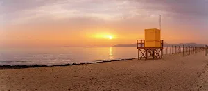 Stand Prints: View of lifeguard watchtower at Playa de Palma at sunset