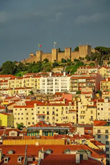 Cozy Prints: View of Lisbon Castle from Santa Justa Lift during golden hour, Lisbon, Portugal, Europe