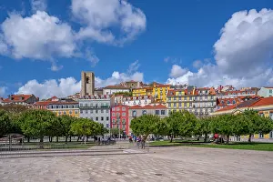 Facades Prints: View of Lisbon Cathedral and colourful buildings in the Alfama District on a sunny day