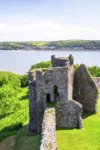 Kingdom Prints: View of Llansteffan Castle ruins overlooking the River Tywi estuary and the village of Ferryside in Carmarthenshire