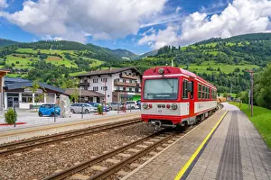 Vehicles Prints: View of local train in Niedernsill on a sunny day