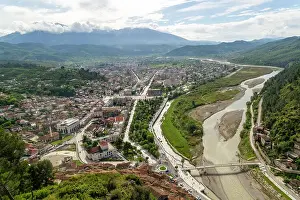 Albania Prints: View looking over city centre of Berat in valley of River Osum with mountains beyond