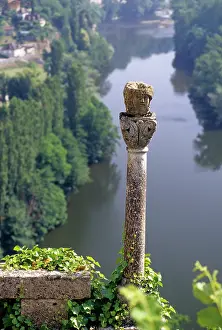 Waterway Prints: View of the Lot River valley showing ancient stone pillar and green landscape near Saint-Cirq-Lapopie in France