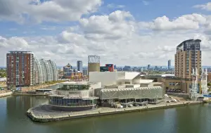 Greater Manchester Prints: View across the Lowry Centre, apartments and new building construction work at Salford Quays Pier 8