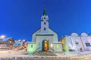 Centre Prints: View of the Lutheran Free Church in the city centre of Reykjavik at dusk in winter