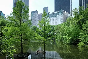 High Rises Prints: View of Manhattan cityscape as seen from The Pond